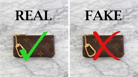 louis vuitton lock and key real vs fake